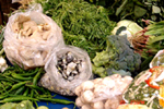 Figure 28. Cuitlacoche (Ustilago maydis) for sale with other mushrooms and vegetables in markets in Mexico City. (Courtesy Vladimir Casteñada) 