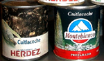 Figure 29. (a, left) Cans of cuitlacoche processed and sold in Mexico. (b, right) A growing market for cuitlacoche among English-speaking consumers is evident from recent label changes which include identification of the fungus as 